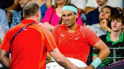 Spain's Rafael Nadal receives medical treatment for his hip during the third set of play against Australia's Jordan Thompson at their men's singles match during the Brisbane International tennis tournament in Brisbane on January 5 (AFP) Spain's Rafael Nadal receives medical treatment for his hip during the third set of play against Australia's Jordan Thompson at their men's singles match during the Brisbane International tennis tournament in Brisbane on January 5 (AFP)