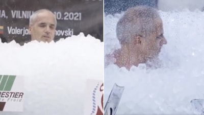 The image shows a man in a box filled with ice. (X/@GWR)