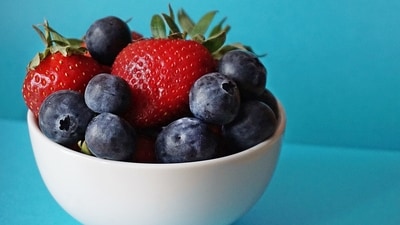 Lower cholesterol: black raspberries and strawberries have been shown to help lower cholesterol in people who are obese or have metabolic syndrome. (Pexels ) Lower cholesterol: black raspberries and strawberries have been shown to help lower cholesterol in people who are obese or have metabolic syndrome. (Pexels )