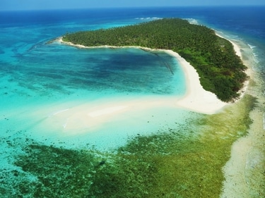 Lakshadweep beckons with its captivating coral reefs, turquoise waters, and tropical island allure.
