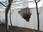 A general view shows a wall damaged by a North Korean artillery attack at Yeonpyeong island, near the 'northern limit line' sea boundary with North Korea. A general view shows a wall damaged by a North Korean artillery attack at Yeonpyeong island, near the 'northern limit line' sea boundary with North Korea.