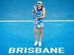 Kazakhstani Elena Rybakina holds the trophy following the women's singles finals match against Belarusian Aryna Sabalenka at the Brisbane International Kazakhstani Elena Rybakina holds the trophy following the women's singles finals match against Belarusian Aryna Sabalenka at the Brisbane International
