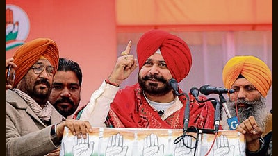 Navjot Sidhu addressing a rally at Kot Shamir, located on the outskirts of Bathinda city, on Sunday. (Sanjeev/HT)