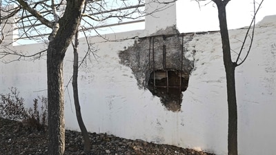 A general view shows a wall damaged by a North Korean artillery attack at Yeonpyeong island, near the 'northern limit line' sea boundary with North Korea. (AFP)