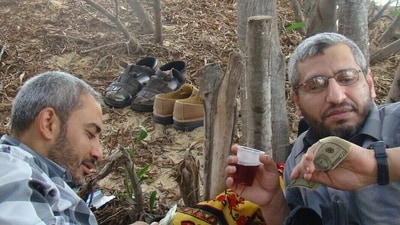 An undated photo released by the Israel Defense Forces shows Muhammed Deif (right), the commander of the Hamas terror group’s military wing. (IDF)