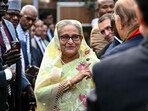 Bangladesh's Prime Minister Sheikh Hasina accepts greetings from the assembled media and election observers during a press conference, a day after she won the 12th parliamentary elections, in Dhaka. Bangladesh's Prime Minister Sheikh Hasina accepts greetings from the assembled media and election observers during a press conference, a day after she won the 12th parliamentary elections, in Dhaka.