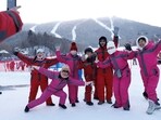 Skiers pose for pictures at the Yabuli ski resort in Harbin, Heilongjiang province, China. Winter tourism resurgence: Chinese destinations thrive as domestic travel rebounds 