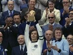 West Germany captain Franz Beckenbauer holds up the World Cup trophy after his team defeated the Netherlands by 2-1, in the World Cup soccer final at Munich's Olympic stadium, in West Germany,  on Jul. 7