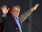 Pakistan's former prime minister Nawaz Sharif waves to his supporters.