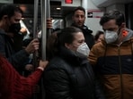Citizens wear protective face masks as they travel in a subway, as health authorities in the region made the use of face masks compulsory in health centres due to the high number of patients with respiratory diseases, in Barcelona, Spain January 5, 2024.