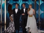 Suits hasn’t been on the air in years, but the fandom remains stronger than ever. Cast members Patrick J Adams and Gabriel Macht reunited at the 81st annual Golden Globes red carpet; they were later joined onstage to present together with costars Gina Torres and Sarah Rafferty.