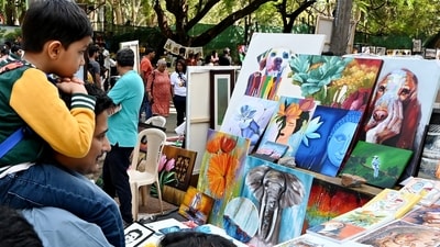 Exhibitors and visitors at 'Chitra Santhe', an annual art fair by Chitrakala Parishat in Bengaluru on Sunday. Chitra Sante is organized every first Sunday in January. (ANI photo) Exhibitors and visitors at 'Chitra Santhe', an annual art fair by Chitrakala Parishat in Bengaluru on Sunday. Chitra Sante is organized every first Sunday in January. (ANI photo)