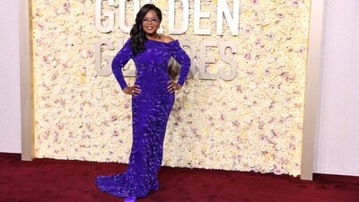 In celebration of the film adaptation of “The Color Purple” musical, Oprah continued her purple streak in a custom fitted long-sleeve gown. The gown was embroidered in a geometric motif with a draped neckline and was designed by Louis Vuitton.&nbsp; (REUTERS)