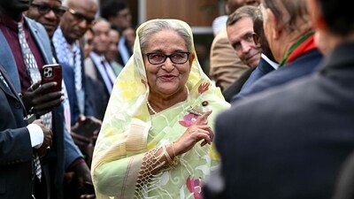 Bangladesh's Prime Minister Sheikh Hasina accepts greetings from the assembled media and election observers during a press conference, a day after she won the 12th parliamentary elections, in Dhaka. (AFP) Bangladesh's Prime Minister Sheikh Hasina accepts greetings from the assembled media and election observers during a press conference, a day after she won the 12th parliamentary elections, in Dhaka. (AFP)