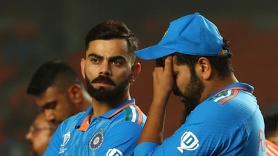 Virat Kohli and Rohit Sharma look dejected after losing the ICC Cricket World Cup final (REUTERS)