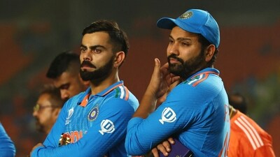 India's Virat Kohli and Rohit Sharma look dejected after losing the ICC Cricket World Cup final. (REUTERS)