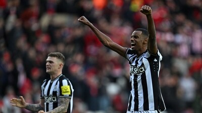 Newcastle United's English defender #02 Kieran Trippier (L) and Newcastle United's Swedish striker #14 Alexander Isak (R) celebrate on the pitch. (AFP) Newcastle United's English defender #02 Kieran Trippier (L) and Newcastle United's Swedish striker #14 Alexander Isak (R) celebrate on the pitch. (AFP)