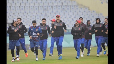 Members of the Afghanistan team during a practice session at the IS Bindra PCA stadium in Mohali on Monday. (Ravi Kumar/HT) Members of the Afghanistan team during a practice session at the IS Bindra PCA stadium in Mohali on Monday. (Ravi Kumar/HT)