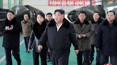 North Korea's leader Kim Jong Un (C) with his daughter Ju Ae. (AFP) North Korea's leader Kim Jong Un (C) with his daughter Ju Ae. (AFP)
