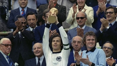 West Germany captain Franz Beckenbauer holds up the World Cup trophy after his team defeated the Netherlands by 2-1, in the World Cup soccer final at Munich's Olympic stadium, in West Germany,  on Jul. 7 (AP)