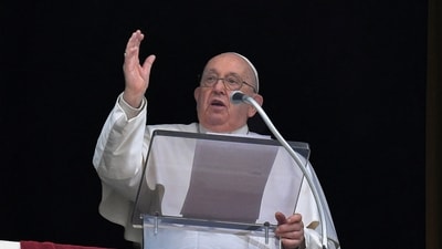 Pope Francis leads the Angelus prayer at the Vatican. (via REUTERS)