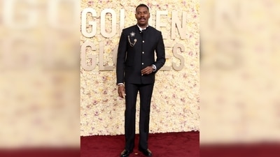 Colman Domingo paid homage to the activist Bayard Rustin, whom he portrays in "Rustin," by wearing a custom Louis Vuitton tuxedo adorned with pins and David Yurman jewellery. Colman Domingo paid homage to the activist Bayard Rustin, whom he portrays in "Rustin," by wearing a custom Louis Vuitton tuxedo adorned with pins and David Yurman jewellery. 