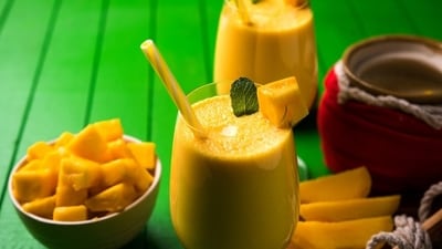 Mango Lassi: Mango lassi can be a delightful and refreshing beverage to enjoy during Pradosh Vrat. It is not only delicious but also a good source of energy and nutrients, making it a perfect treat for your fasting day. (File Photo) Mango Lassi: Mango lassi can be a delightful and refreshing beverage to enjoy during Pradosh Vrat. It is not only delicious but also a good source of energy and nutrients, making it a perfect treat for your fasting day. (File Photo)