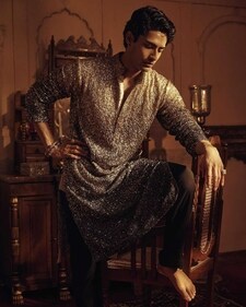 Slip into a silver and black ombré kurta and team it with straight-cut black pants for the after-party (Photo: Instagram) Slip into a silver and black ombré kurta and team it with straight-cut black pants for the after-party (Photo: Instagram)