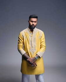 Like cricketer Hardik Pandya, opt for a yellow short kurta with white embroidery and pair it with a white pyjama (Photo: Instagram) Like cricketer Hardik Pandya, opt for a yellow short kurta with white embroidery and pair it with a white pyjama (Photo: Instagram)