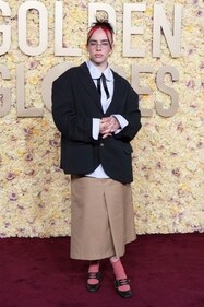 Billie Eilish arrives at the 81st Golden Globe Awards on Sunday, Jan. 7, 2024, at the Beverly Hilton in Beverly Hills, Calif. (Jordan Strauss/Invision/AP)