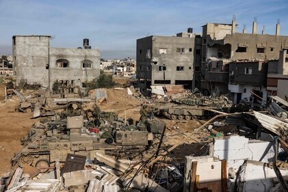 This picture taken during a media tour organised by the Israeli military on January 8, 2024, shows troops operating in the area of al-Bureij in the central Gaza Strip. (AFP) This picture taken during a media tour organised by the Israeli military on January 8, 2024, shows troops operating in the area of al-Bureij in the central Gaza Strip. (AFP)
