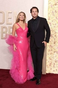 Margot Robbie and Tom Ackerley arrived on the red carpet and made their fans swoon. (Amy Sussman/Getty Images) Margot Robbie and Tom Ackerley arrived on the red carpet and made their fans swoon. (Amy Sussman/Getty Images)