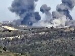 Israel-Hamas War: Smoke rises following what the Israeli armed forces say was an air strike on Hezbollah targets at a location given as Lebanon.