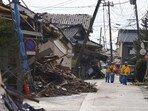 Police officers work in a quake-hit area in Suzu, Ishikawa prefecture, Japan. Police officers work in a quake-hit area in Suzu, Ishikawa prefecture, Japan.
