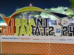 A model of the Vibrant Gujarat Global Summit 2024 placed at a roadside ahead of the summit, in Gandhinagar (PTI) A model of the Vibrant Gujarat Global Summit 2024 placed at a roadside ahead of the summit, in Gandhinagar (PTI)