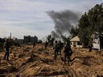 Israeli troops operating in the area of al-Bureij in the central Gaza Strip, amid continuing battles between Israel and the Palestinian militant group Hamas. (AFP) Israeli troops operating in the area of al-Bureij in the central Gaza Strip, amid continuing battles between Israel and the Palestinian militant group Hamas. (AFP)