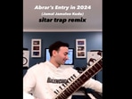 Man playing Jamal Kudu on sitar. Man playing Jamal Kudu on sitar.