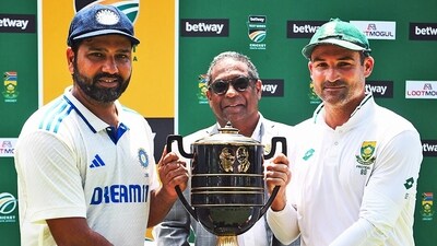 India's skipper Rohit Sharma and South Africa's skipper Dean Elgar pose for a photo with the trophy (ICC/X) India's skipper Rohit Sharma and South Africa's skipper Dean Elgar pose for a photo with the trophy (ICC/X)