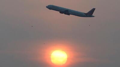 An Air India passenger plane passes the sun on a smoggy morning in Ahmedabad. (REUTERS FILE PHOTO) An Air India passenger plane passes the sun on a smoggy morning in Ahmedabad. (REUTERS FILE PHOTO)