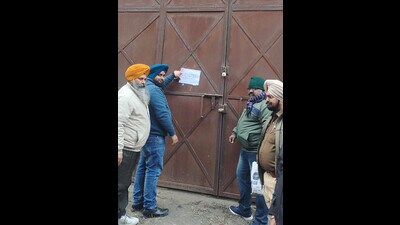 Ludhiana Municipal Corporation (MC) sealed four buildings on Tuesday as the owners failed to submit Change of Land Use (CLU) charges and other pending dues with the department. These buildings are three industrial buildings in Mahavir Jain Colony, Tajpur road, and a commercial building in Jamalpur area (Chandigarh road). (HT Photo)