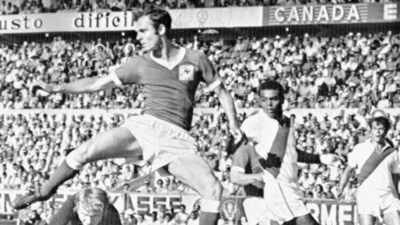 FILE - West Germany's Franz Beckenbauer stops an attack during the Football World Cup match (AP) FILE - West Germany's Franz Beckenbauer stops an attack during the Football World Cup match (AP)