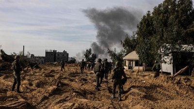 Israeli troops operating in the area of al-Bureij in the central Gaza Strip, amid continuing battles between Israel and the Palestinian militant group Hamas. (AFP)