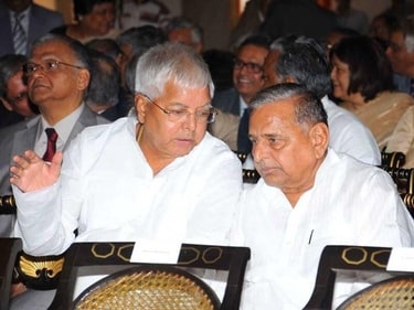 Samajwadi Party supremo Mulayam Singh Yadav and RJD chief Lalu Prasad are seen during the swearing in ceremony of new Chief Justice of India Altamas Kabir at Rashtrapati Bhavan in New Delhi. PTI Samajwadi Party supremo Mulayam Singh Yadav and RJD chief Lalu Prasad are seen during the swearing in ceremony of new Chief Justice of India Altamas Kabir at Rashtrapati Bhavan in New Delhi. PTI