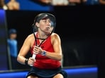 Jessica Pegula of the United States is framed by her racquet as she hits a return shot to Ajla Tomljanovic of Australia 