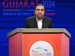 Chairman and Managing Director of Reliance Industries, Mukesh Ambani addresses a gathering during the inaugural session of Vibrant Gujarat Global Summit 2024. (AFP) Chairman and Managing Director of Reliance Industries, Mukesh Ambani addresses a gathering during the inaugural session of Vibrant Gujarat Global Summit 2024. (AFP)