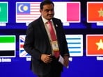 India's Adani Group chairman Gautam Adani leaves after addressing the Vibrant Gujarat Global Summit in Gandhinagar on Wednesday, 
