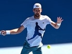 Serbia's Novak Djokovic hits a return during a practice session ahead of the Australian Open tennis tournament in Melbourne on January 9 Serbia's Novak Djokovic hits a return during a practice session ahead of the Australian Open tennis tournament in Melbourne on January 9