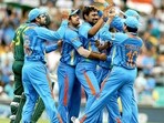 Praveen Kumar (without cap) celebrating with teammates Praveen Kumar (without cap) celebrating with teammates