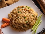 A woman was slammed for posting a video of a person eating rice with hands. A woman was slammed for posting a video of a person eating rice with hands.