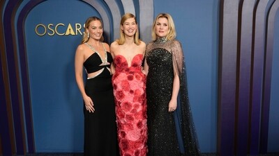 After just a day to recover from Golden Globes 2024, celebrities gathered again on the red carpet to celebrate the honorary Oscars. Margot Robbie (from left), Rosamund Pike and Emerald Fennell pose together at the Governors Awards on Tuesday at the Dolby Ballroom in Los Angeles. (AP) After just a day to recover from Golden Globes 2024, celebrities gathered again on the red carpet to celebrate the honorary Oscars. Margot Robbie (from left), Rosamund Pike and Emerald Fennell pose together at the Governors Awards on Tuesday at the Dolby Ballroom in Los Angeles. (AP)